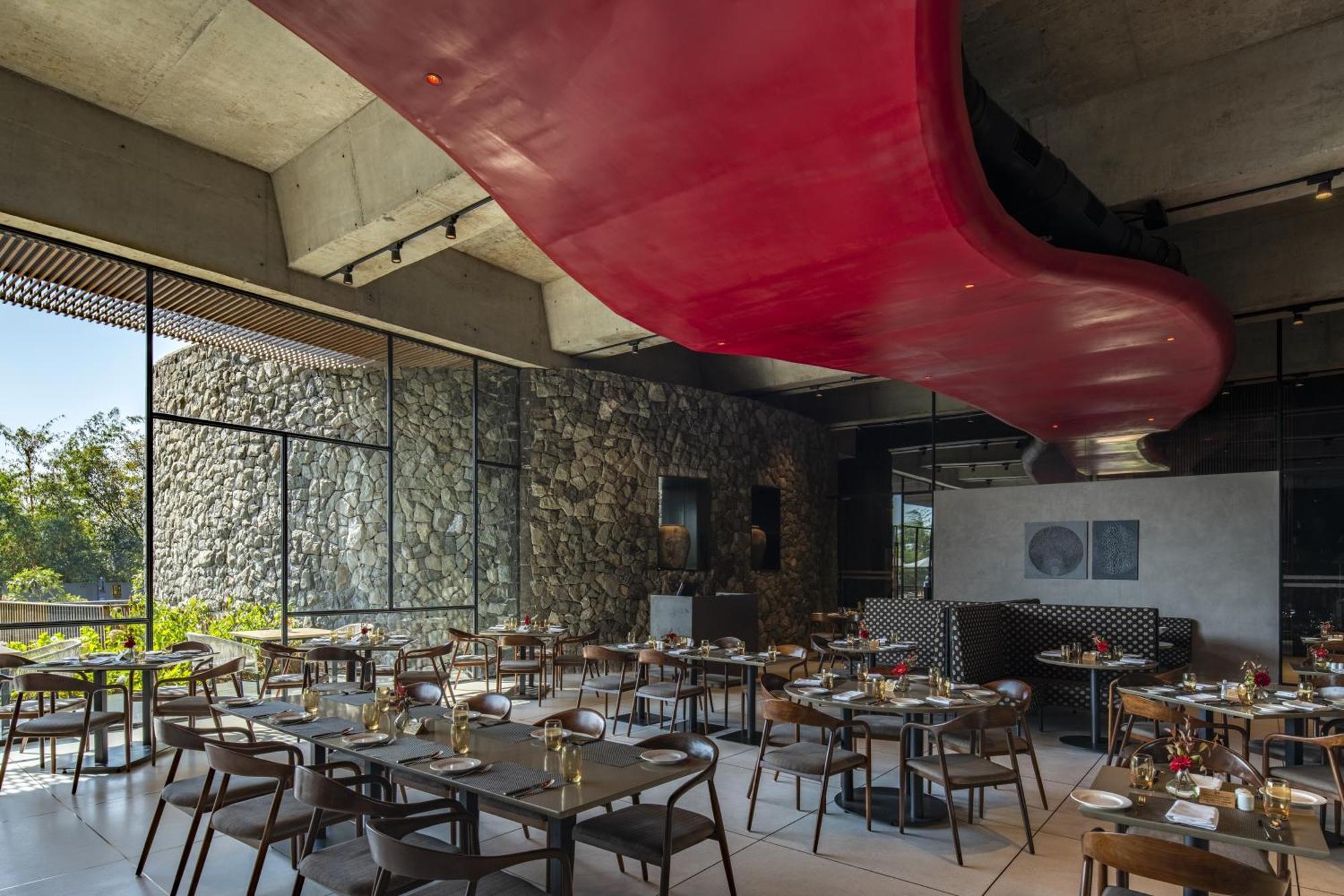 Radisson Resort And Spa Lonavala Kültér fotó Interior of the restaurant